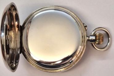 English J.W.Benson 'The Bank' pocket watch with top wind and pin set time change in a silver case with London hallmark for c1916. Signed white enamel dial with black Roman hours and gilt hands with subsidiary seconds dial at 6 o/clock. English signed 3/4 plate jewelled lever movement with split bi-metallic balance and numbered 40127 with that number repeated on the 'JWB' case back and complete with original red leather and blue plush velvet retail case.