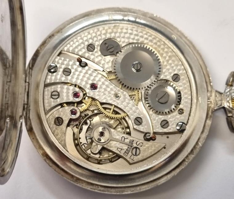 Swiss Cortebert 1920s dress pocket watch with top wind and time change in .900 silver case with Swiss hallmarking. Signed matt silvered dial with black numeric hours and blued steel hands with subsidiary seconds dial at 6 o/clock. Engine turned decorated jewelled lever movement with overcoil hairspring with 'HF' signed case back numbered 916753.