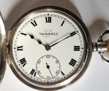 Swiss Tavannes Watch Company half hunter pocket watch in a silver Dennison case with top wind and time change and hallmarked for Birmingham c1940. Black Roman hours on the outer case and internal signed white enamel dial with black Roman hours and blued steel hands with subsidiary seconds dial at 6 o/c. Signed Swiss calibre 918 15 jewel 3 adjustments jewelled lever movement with split bi-metallic balance and overcoil hairspring with Dennison case back numbered 708246.