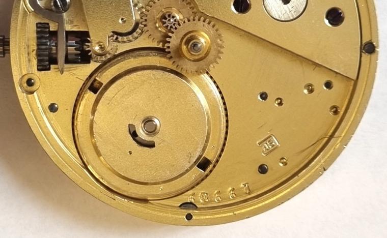 Swiss C19th half hunter pocket watch in a silver case with top wind and pin set time change with makers mark 'JS' to case and under dial. Black Roman hours on the outer case and internal white enamel dial with black Roman hours and blued steel hands with subsidiary seconds dial at 6 o/c. High quality Swiss jewelled lever movement with wolf teeth winding gear with movement and silver case numbered 62667 and case dust cover bearing an 1884 presentation inscription.