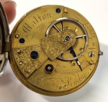 English silver cased fusee lever pocket watch by R.B.Kirby of Malton hallmarked for London c1873. Key wind and time change with white enamel dial and black Roman hours with gilt hour and minute hands and subsidiary seconds dial. Full plate fusee movement with English jewelled lever escapement and numbered 17277, the silver case signed 'BW' and stamped 'W.T.R' and repeating the number 17277. Case diameter - 48mm.