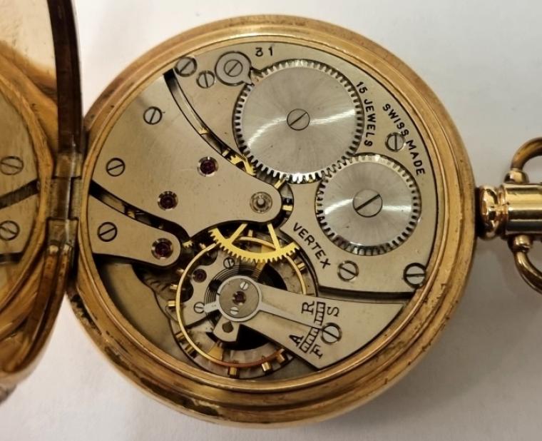 Swiss Vertex pocket watch with top wind and time change in a gold plated Dennison Moon case numbered 828494. Signed white enamelled dial with black Roman hours and blued steel hands with subsidiary seconds dial at 6o/c. Swiss made Vertex signed calibre 31 15 jewel jewelled lever movement with overcoil hairspring.