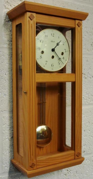 Brand new pine cased 8 day spring driven Westminster chiming pendulum wall clock by Franz Hermle & Son. Case height - 22".