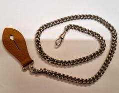Mid c20th white metal pocket watch chain with brown leather button clip  19"