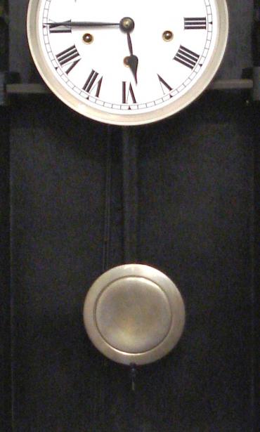 Black stained oak wood cased 8 day Westminster chime wall clock by Winterhalder and Hofmeier. Refurbished white painted dial, black roman numerals with black painted steel hands. Spring driven, pendulum movement dating from the 1920's.
