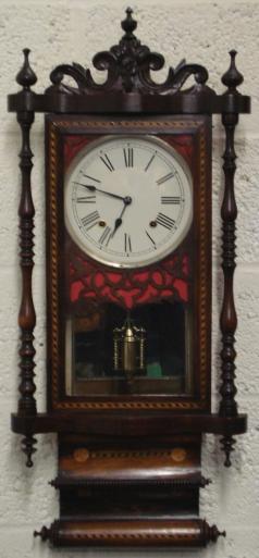 ornate cased american 8 day bell striking wall clock