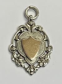 Silver with Gilded Shield Watch Medallion