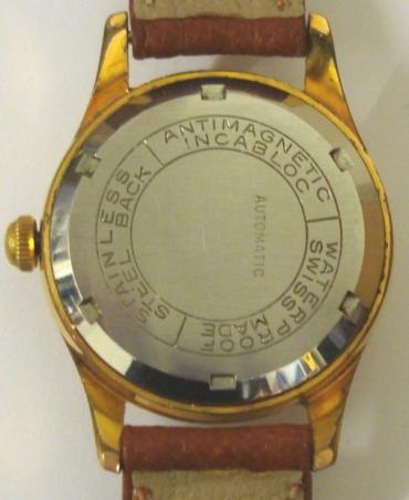 Swiss Curtis automatic wrist watch in a gold plated case with stainless steel back, on a tan leather strap with gilt buckle. Brushed silvered dial with gilt dart and 12, 3, 6 and 9 hour markers with matching gilt luminous insert hands and sweep seconds. Swiss made Felsa 1560 25 jewel incabloc movement with screw down case back.