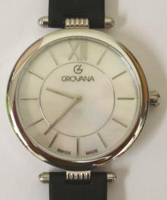 Brand new mid-size quartz wrist watch by Grovana in an all stainless steel case with black leather strap and silver buckle. Sapphire crystal over a mother of pearl dial with polished silver hours and matching hands. Brand new model 4450.1CK watch number 1533 water resistant to 50 metres complete with box, all paperwork and 2 year manufacturer's guarantee.