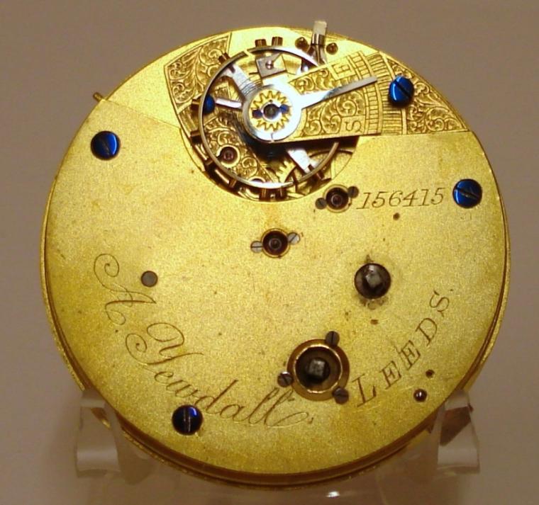 English lever silver cased key wound fusee centre seconds chronograph with side stop lever by A.Yewdall of Leeds, hallmarked throughout for Chester c1910. White enamel dial with black Roman hours and outer 1/5 second track with blued steel hands and sweep seconds hand. Signed back plate with engraved cock piece, split bi-metallic balance and jewelled lever escapement, movement and case numbered #156415.