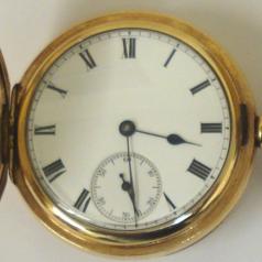 American Waltham Traveler full hunter pocket watch in a gold plated Dennison case with top wind and time change. White enamel dial with black Roman hours, black steel hands and subsidiary seconds dial. Jewelled lever movement with split bi-metallic balance and overcoil hairspring. Dennison case number #72339 and signed movement number #12386783 circa 1903.