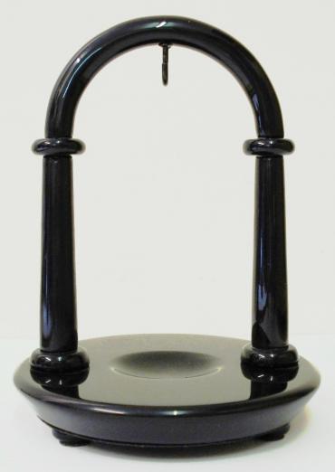 Modern wooden pocket watch stand by the 'Rapport' company. Available in both light and dark brown and black.