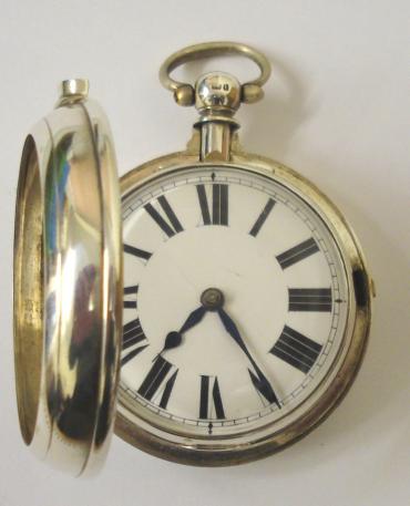 English silver pair case key wound fusee pocket watch maker unknown hallmarked throughout for London c1883. Domed glass over white enamel dial with black Roman hours and blued steel hands. Engraved, jewelled cock piece with back plate and inner case numbered #52778 with initials W.J also applied to the inner case.
