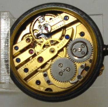 Swiss gun metal cased petite pocket watch by Henry Capt, Geneva with applied gold monogram back. Top wind and rocking bar time change with black enamel dial and gilt Arabic hours and outer minute track with matching gilt hands hands and subsidiary seconds dial. Top quality signed jewelled lever movement with wolf teeth gearing and numbered #40180 with initials FB and #0388 on the case back.