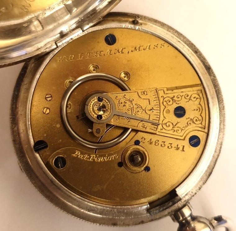 American Watch Co. Waltham lever pocket watch in a silver case with Birmingham hallmark for 1883, case numbered #55528 and 'AB'. Key wind and time change with signed white enamel dial and black Roman hours with gilt hands and subsidiary seconds dial. Back plate signed and numbered #2463341 with engraved cock piece and jewelled end stone.