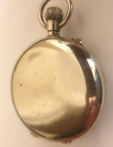 Swiss early c20th nickel cased pocket watch with top wind and rocking bar time change. White enamel dial signed Vibrona, with black Roman hours and blued steel hands with subsidiary seconds dial at 6 o/c. Plain pin lever movement with a jewelled balance and machine decorated back plate.