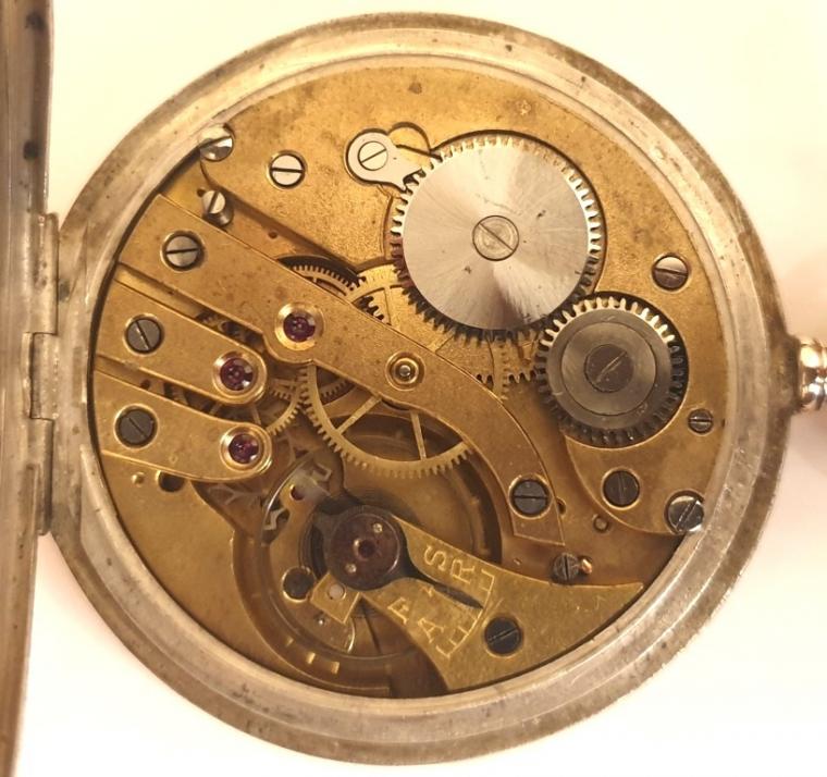 Swiss unsigned silver cased pocket watch late circa 1920. Top wind and time change with two tone silver and champagne dial and black Arabic hours with blued steel hands hands. The silver case stamped 0.800 together with a Swiss 1882-1934 proof mark and numbered #3852.23. Jewelled split bar movement by Font calibre 3, with jewelled lever escapement and breguet overcoil hairspring with split bi-metallic balance.