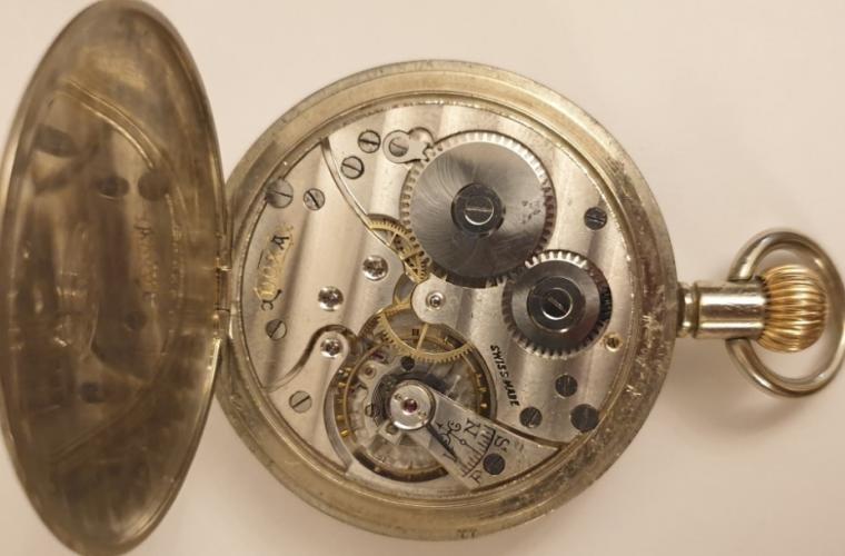 Swiss white metal cased pocket watch with worn out broad arrow mark and dial inscribed '30 Hour Luminous Mark' and 'G.S.TYPE B.E.121'. Top wind and time change with black enamel dial and white and luminous arabic hours with aged white hands and a subsidiary seconds dial at 6 o/c. Swiss case and movement signed DOXA (part of the Dirty Dozen) with a jewelled lever movement with bi-metallic balance and overcoil hairspring, the case numbered #1222803 circa 1940.