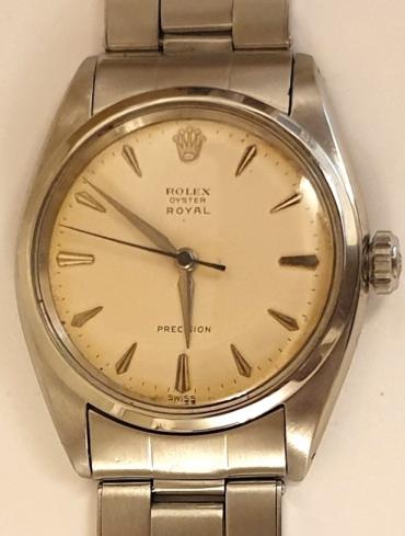 Rolex Oyster Royal Precision manual wind wrist watch in a stainless steel case on an original Rolex Oyster bracelet. Signed Rolex silvered dial with polished dart hours and matching hands with a black sweep seconds hand. Swiss signed Rolex calibre 1210 17 jewel movement numbered 28688 model 6426 dating to the second quarter 1959.