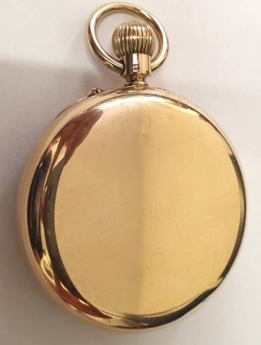 English open face pocket watch in a 9ct gold case c1910/20. Top wind and pin set rocking bar time change. White enamel dial with black Roman hours and blued steel hands with a subsidiary seconds dial at 6 o/c. Side opening 3/4 plate jewelled lever movement with overcoil hairspring and split bi-metallic balance and numbered 140452.