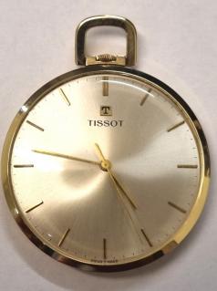 Swiss Tissot 14ct gold dress pocket watch c1960 with top wind and time change. Signed silvered dial with gilt baton hours and polished gilt hands with sweep seconds hand. Signed Swiss 17 jewel jewelled lever movement calibre 781-1 numbered 8466150 with the case back signed and numbered 41303-20.