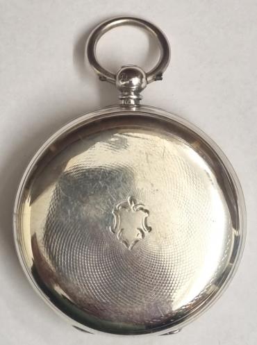 English silver cased unsigned fusee lever pocket watch hallmarked for London c1865. Key wind and time change with white enamel dial and black Roman hours with blued steel hands and subsidiary seconds dial. Plain back plate with engraved cock piece and fusee movement and numbered 1220.